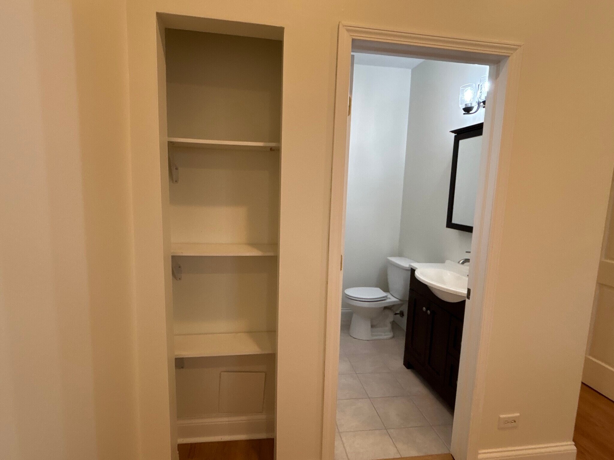 Main level primary bedroom 1 ensuite bath and open shelving - 2608 W Evergreen Ave