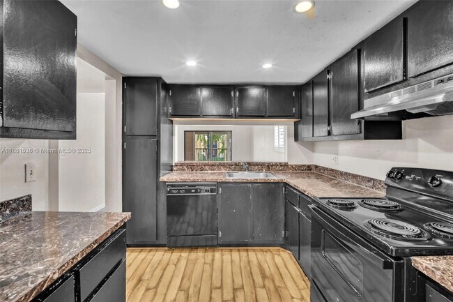 Building Photo - 6575 W Oakland Park Blvd