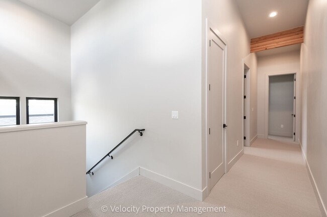 Building Photo - Brand New Westside Townhome!