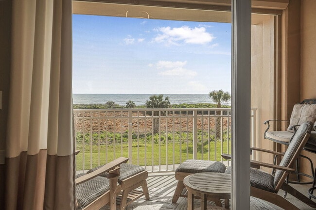 Building Photo - Available for a 7-12 month lease, Unit 208 has a beautiful oceanfront setting.