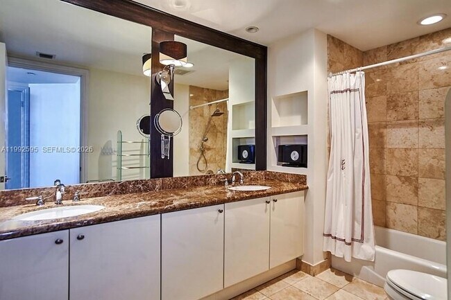 Building Photo - 10225 Collins Ave