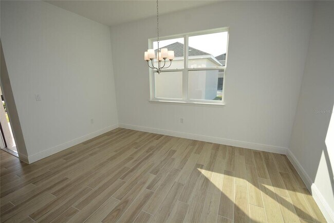 Building Photo - 5144 Firebush Dr