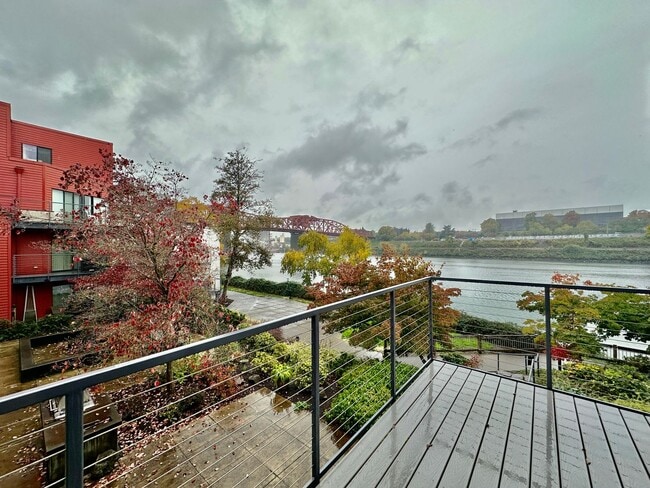 Building Photo - Top-Floor Riverfront Living with Broadway Bridge Views | 2 Bed + 2 Bath + Parking