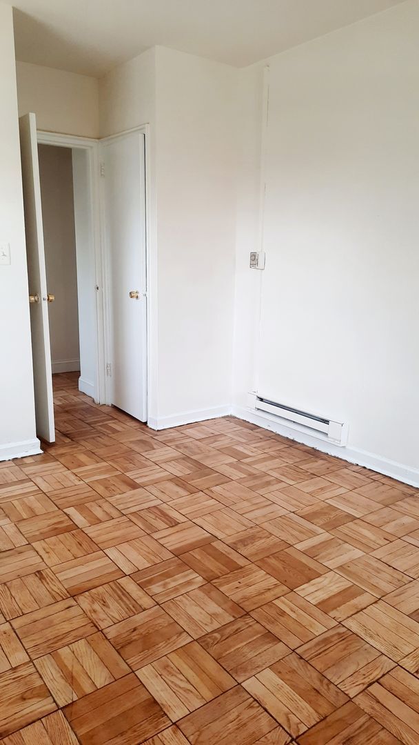 Building Photo - NOW LEASING AT BUNKER HILL FLATS!