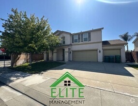 Building Photo - Spacious 6-Bedroom Home with Two Master Su...