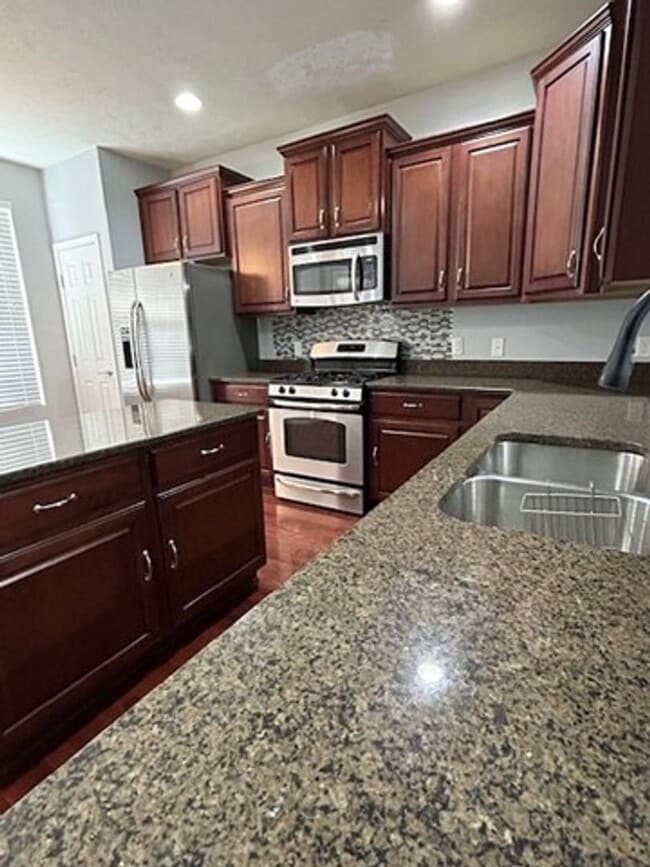Building Photo - Beautiful 2-Bedroom Townhome in Copley with 2-Car Garage + EV Charger