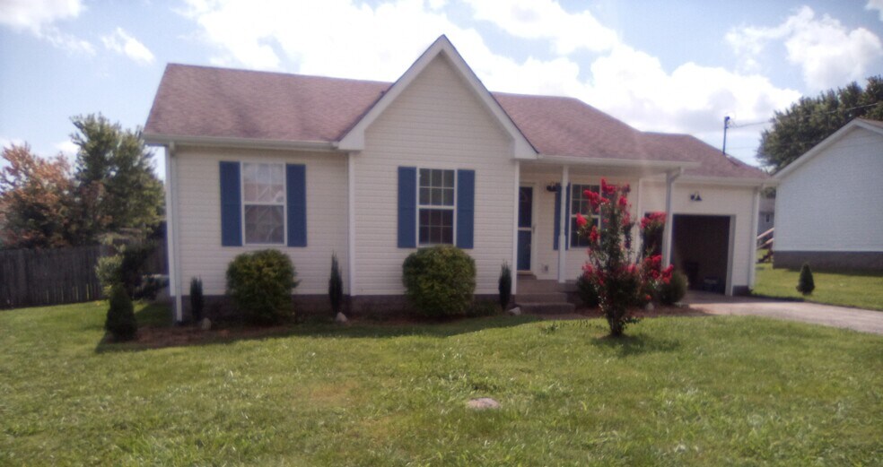 Front yard pops with red crape myrtle! - 324 Atlantic Ave