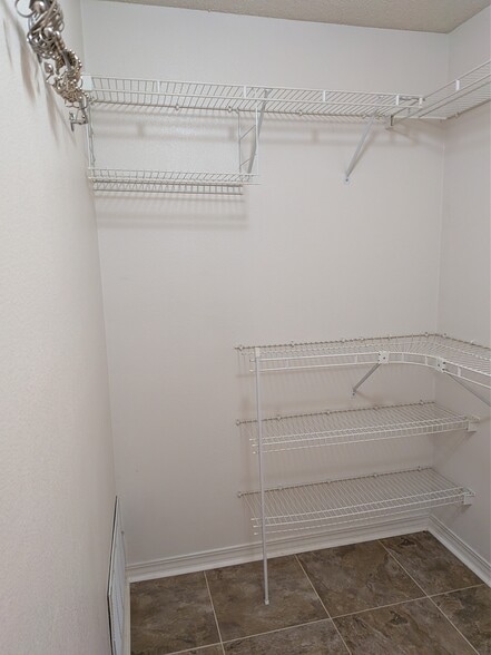 BR1 closet (panorama) - 574 Rough Leaf Ln