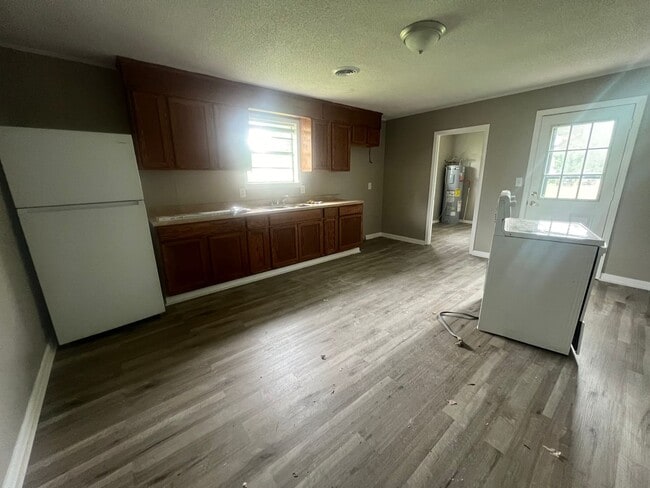 Building Photo - Three bedroom home with XL garage!