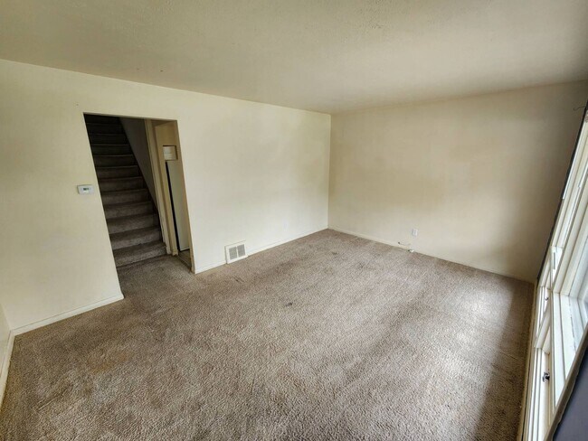 Building Photo - Move-In Special: Save $300 on This Charmin...