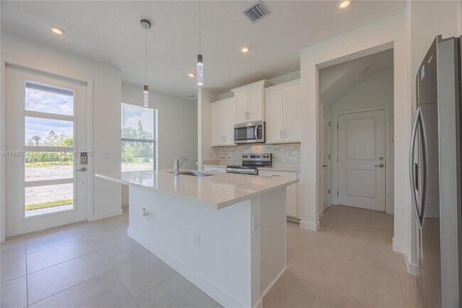 Building Photo - 7064 Channing Ave