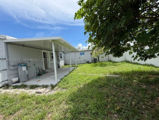 Building Photo - 9016 NW 35th Ct