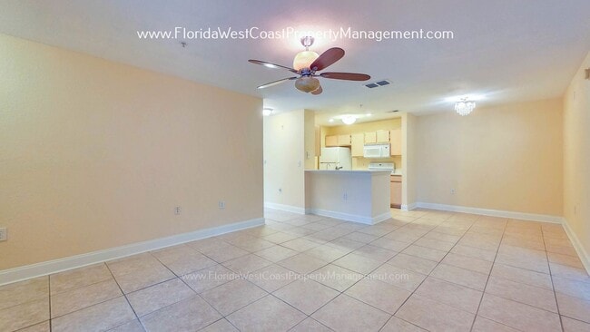 Building Photo - MOVE IN READY! LARGE 2 BEDROOM/2 BATH PLUS ATTACHED GARAGE! TILE/LVP THROUGHOUT!