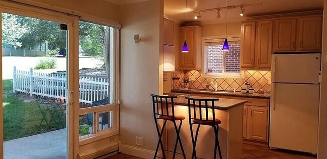 Building Photo - One Bedroom Condo Walking Distance to CU with Fenced Backyard and Flatiron Views!