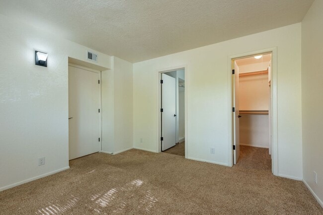 Building Photo - Light and Bright Second Level Condo Available Now!