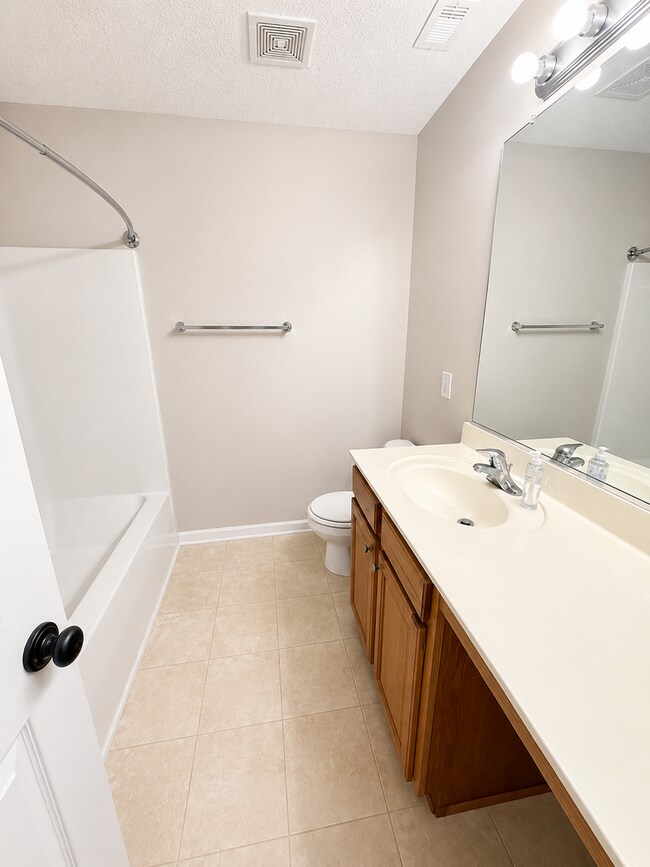 Building Photo - Three bedroom, 2.5 bath townhome in Whitsett