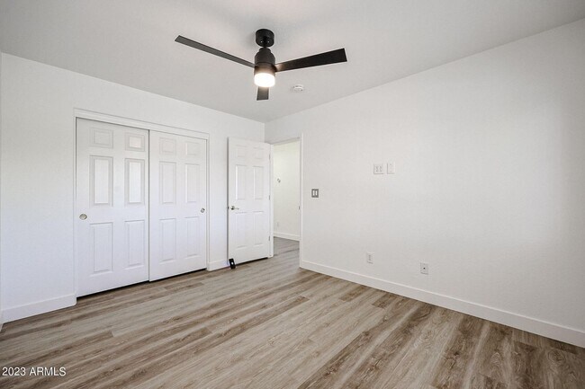Building Photo - BRAND NEW 5 BEDROOM HOME IN PHOENIX