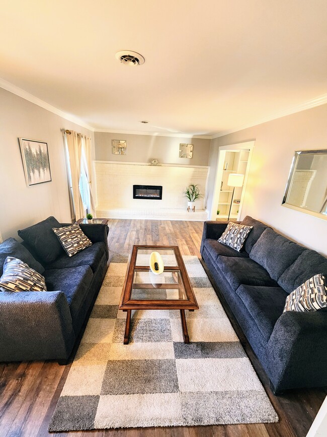 Cozy living room with a fireplace - 34 Shenandoah Dr