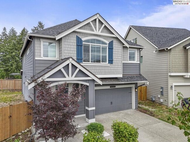 Building Photo - Your Ideal Home in Puyallup Awaits – Peace...