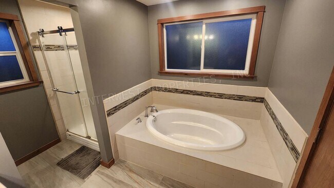 Building Photo - 3 bd 2.5ba Ranch Style Home with Fenced Yard, W/D in Unit, Fireplaces & 2 Car Garage!