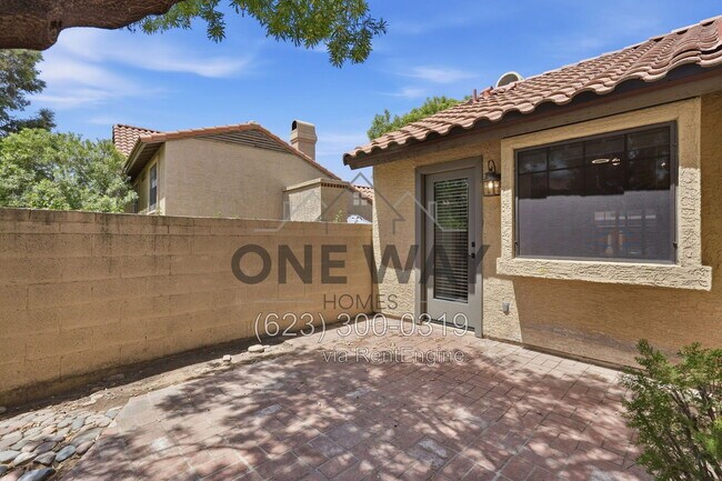 Building Photo - 5704 E Aire Libre Ave