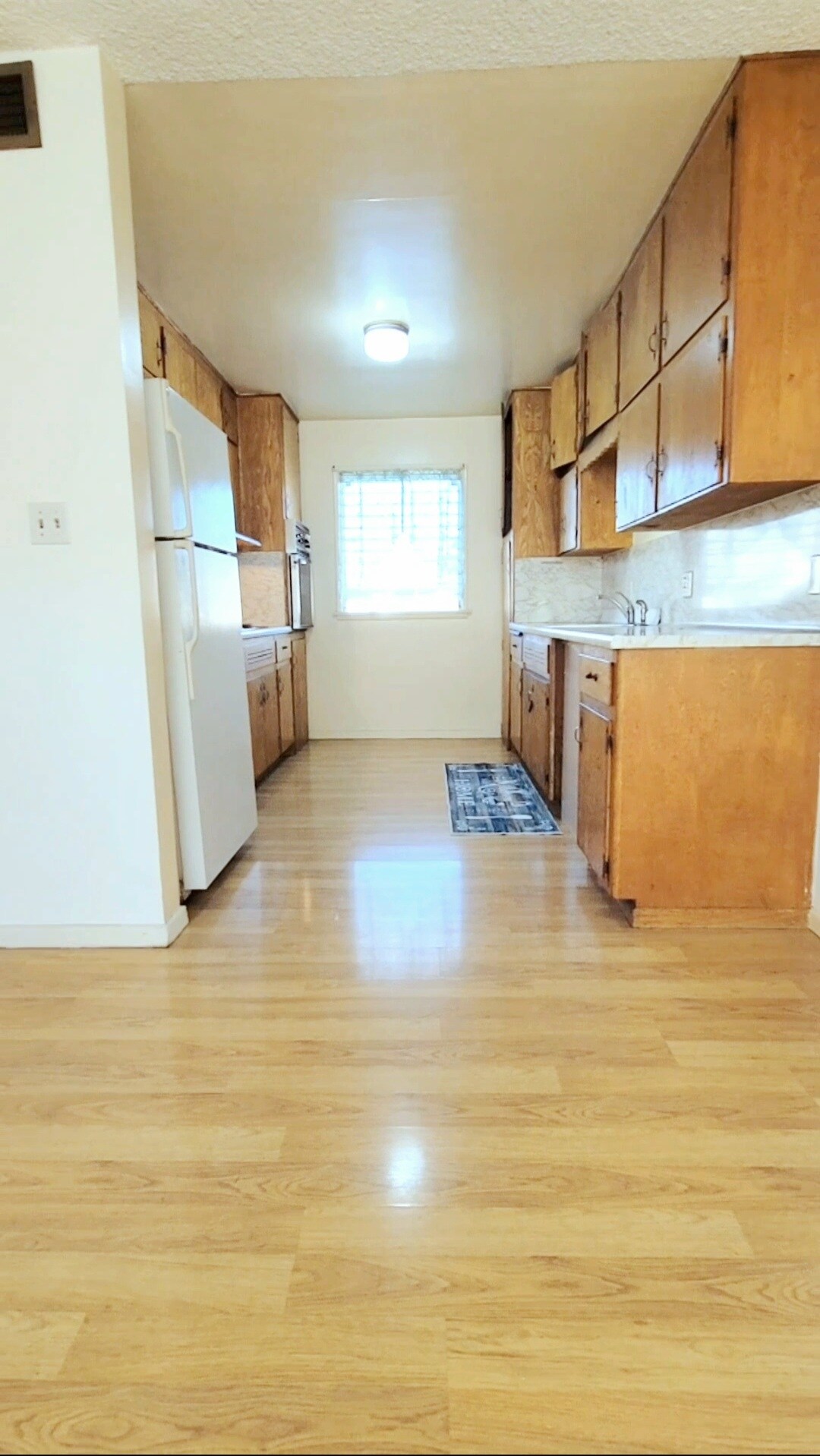 Full kitchen has stove and oven - 2239 N Frederic St