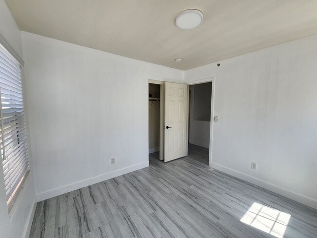 Building Photo - Sleek 2 story home with tile in most living areas and upgraded kitchen.