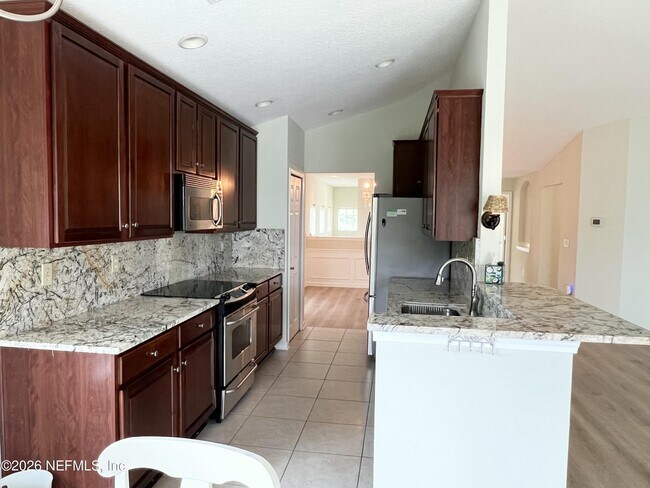 Building Photo - 6600 White Blossom Cir