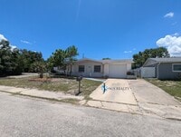Building Photo - Must See 3/2/1 over 1000sf with tile/laminate floors, fresh paint, fenced yard and large living r...