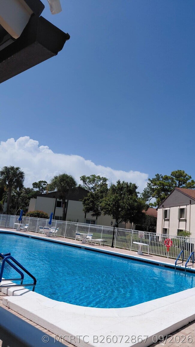 Building Photo - 5991 Whispering Pine Way