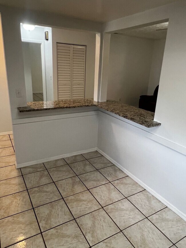 Building Photo - 3 BEDROOM 2 BATH CONVENIENTLY LOCATED WITH A TROPICAL OASIS IN THE BACK YARD!