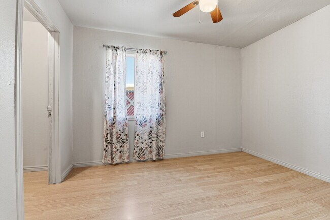 Building Photo - $1,930.95 - 3 Bedrooms, 1 Bathroom, Single Family Home in Aurora with fenced Yard!