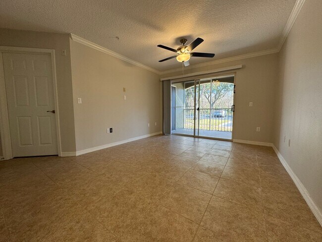 Building Photo - Oviedo 2/2 Condo with Tile & LVP Flooring, Updated Baths, New Paint & Appliances!