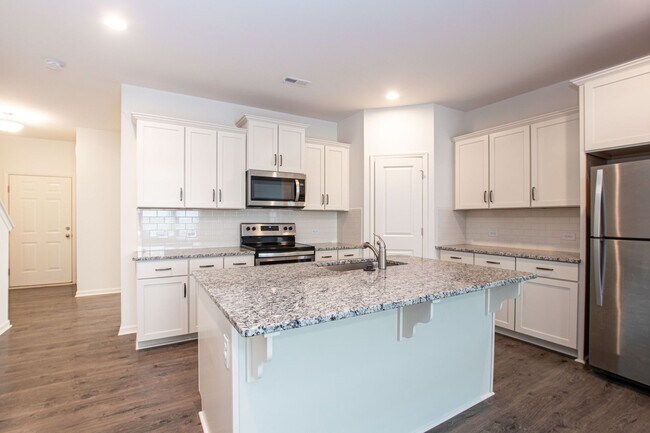 Building Photo - BEAUTIFUL 3 Bedroom Townhome Bonterra Village AVAILABLE NOW