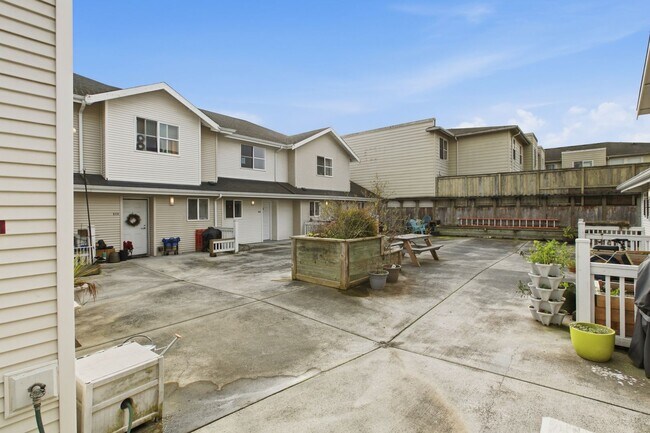 Building Photo - Two-Story Condo Near Delridge Library with Private Courtyard & Easy Downtown Access