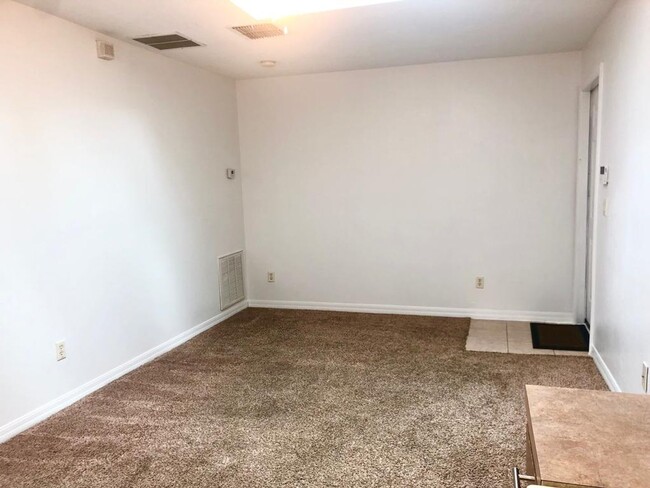 Building Photo - MOVE IN NOW! RENT INCLUDES ELECTRICITY, WA...