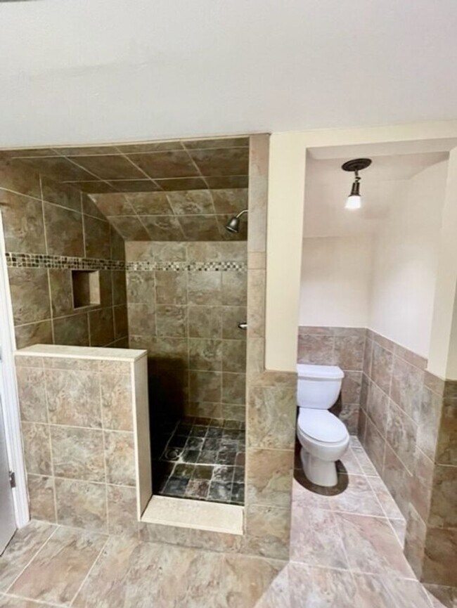 Building Photo - Introducing WesleyHeights401, a charming 3-bedroom, 2-bathroom house located in the heart of Char...