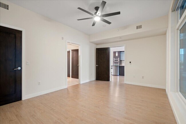 Building Photo - Resort Style Amenities in a Luxury, Modern 2 Bedroom Condo