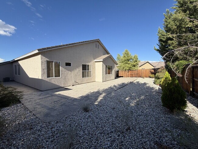 Building Photo - South Reno Home with 4 Bedrooms + 3 Car Garage!