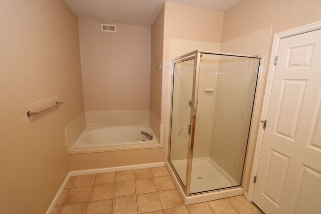 Building Photo - Spacious Top-Floor Condo in Las Casas at Broadmoor Bluffs | 2 Bed / 2 Bath + Garage, Very close t...