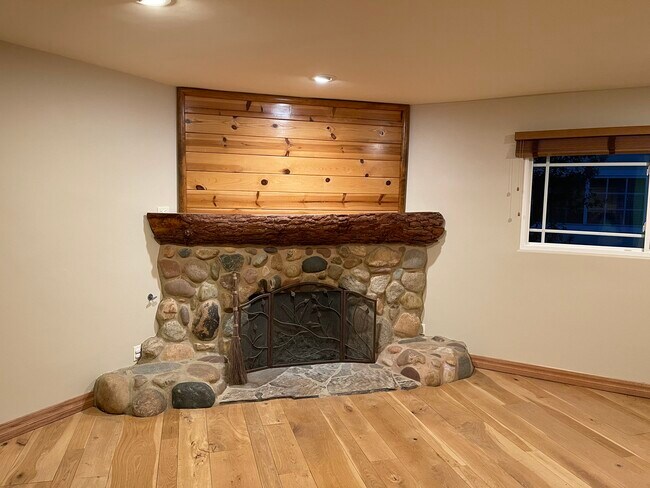 Cozy Oak floor and Stone Fireplace - 23437 Vanowen St