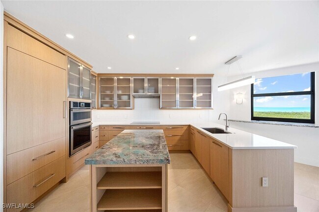 Building Photo - 6075 Pelican Bay Blvd