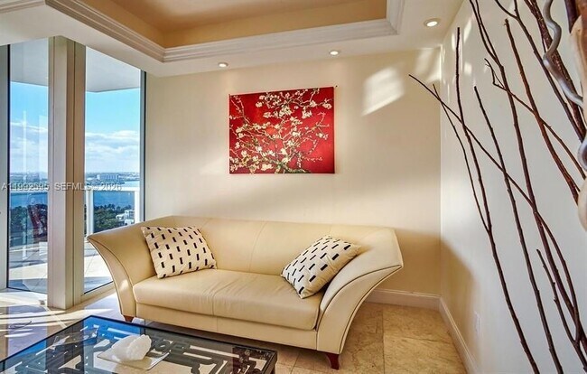 Building Photo - 10225 Collins Ave