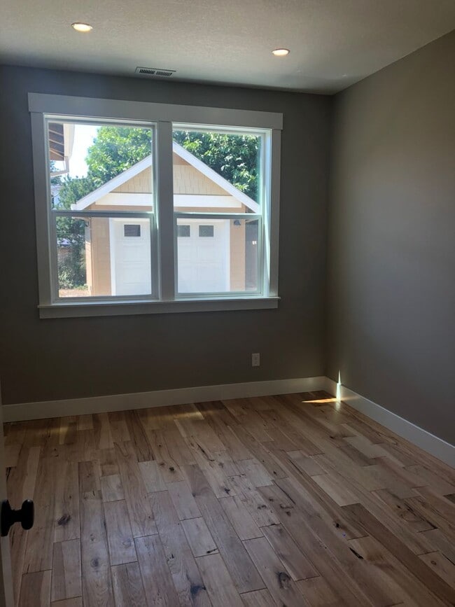 Building Photo - Beautiful New Home with Garage and Yard! A...
