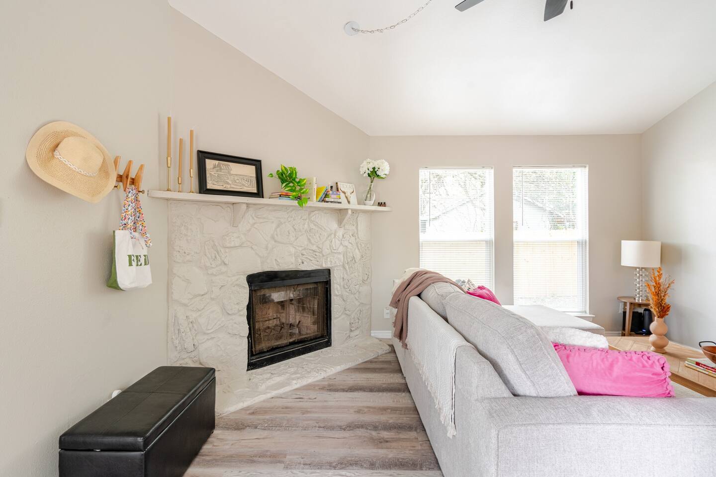 Living room with Fireplace, large window and new blinds throughout - 6307 Okner Ln