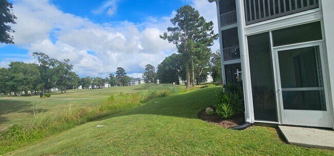 Building Photo - -First-Floor End-Unit | Fully Furnished 2B...