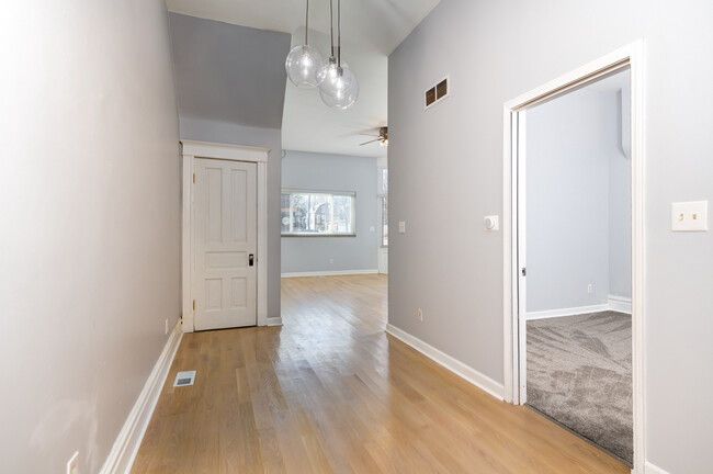 Hall to Living room - Closet Ahead and Primary Bedroom on Right - 4173 Juniata St