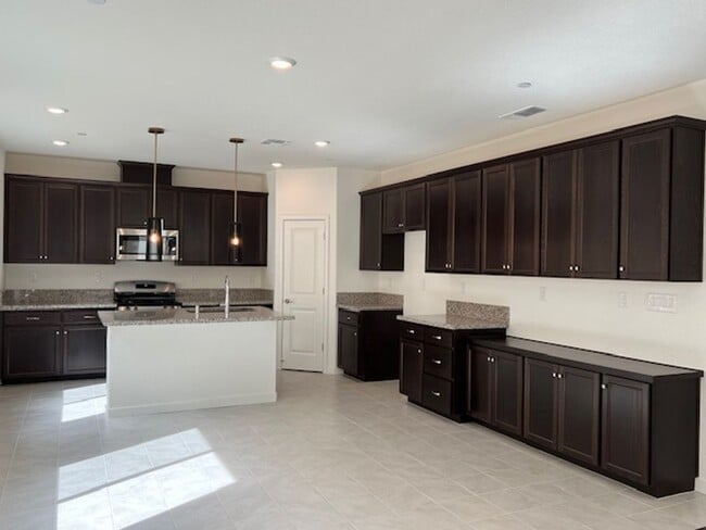 Building Photo - BEAUTIFUL SOLAR  2 STORY HOME IN NATOMS! 4...