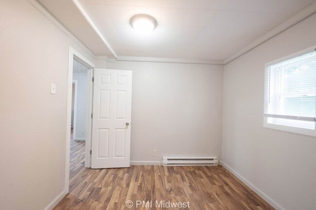 Building Photo - "Cozy 1-Bedroom Oasis in Greenfield – Perf...