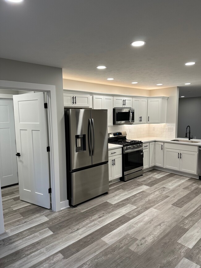 kitchen with door leading to garage - 1620 Gunnison Rd